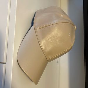 Super cute faux leather adjustable baseball hat.